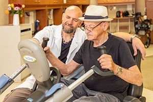 A patient doing rehab with a therapist at Willow Springs